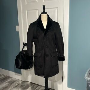 Stunning and cozy. This brand speaks for itself NWOT Black w warm cozy interior.